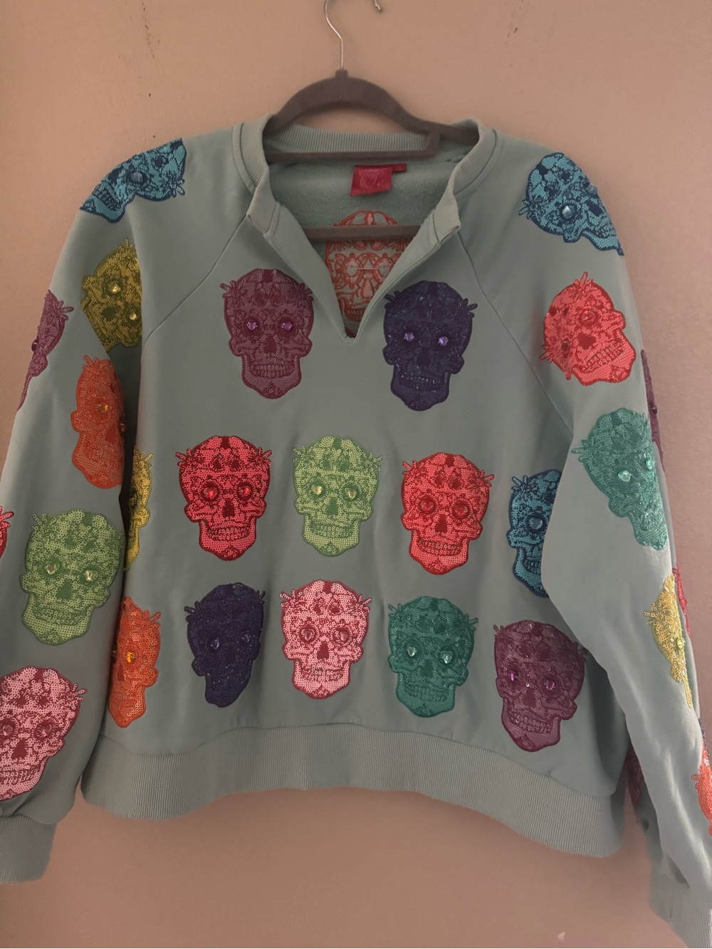 QUEEN OF SPARKLES Mint Pullover Sweatshirt with Multicolor Embroidered Skulls